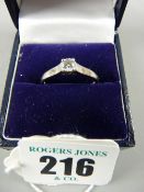 An eighteen carat white gold diamond solitaire ring, approximate one quarter carat stone with 3.5
