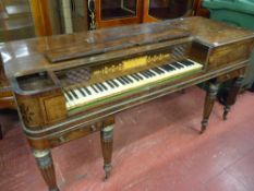 A William IV crossbanded and inlaid mahogany spinet with gilt metal mounts, ebony and ivory keys