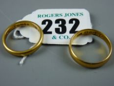 Two, twenty two carat gold plain wedding bands, 8.5 grms