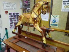 A 20th Century compact trestle rocking horse (mane and tail intact)