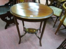 A circa 1900 Sheraton revival inlaid mahogany side table, oval top with central fan inlay and