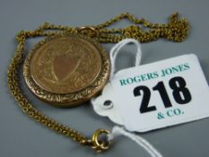 A nine carat gold front and back circular photo locket with nine carat gold link chain, 7.5 grms