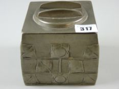Liberty Pewter - a square pewter tea caddy with raised floral decoration in the Arts & Crafts