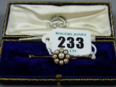 A gold bar brooch with a centre cluster of nine pearls, 3.7 grms gross