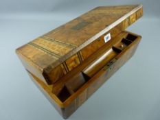 A walnut and inlaid gentleman's oblong lap desk having twin wide bands of ebony and dart inlays with