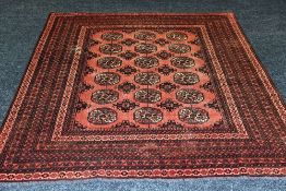 A WASHED AFGAN VILLAGE RUG in a Bokra design, 265 x 182 cms
