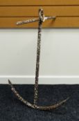 AN OLD IRON MARITIME ANCHOR of traditional form, 87cms high