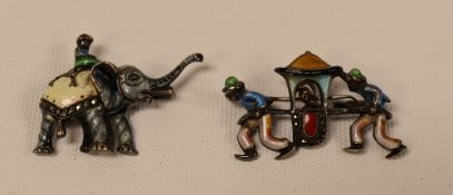 TWO EXOTIC BROOCHES in the form of an elephant and rider and a sedan