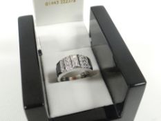 A DIAMOND CLUSTER & WHITE GOLD RING