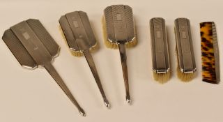 A SIX-PIECE SILVER ART DECO DRESSING-TABLE SET, Birmingham 1933