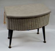 VINTAGE LOOM STANDING SEWING BOX with hinged cushioned lid and cushioned interior raised on four