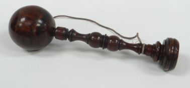 A TURNED OLIVE WOOD BILBOQUET, 24cms long BBC Bargain Hunt