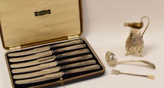 A PARCEL OF SILVER COMPRISING CREAM JUG, SUGAR LADLE, CASED SET OF TEA-KNIVES & TOASTING FORK