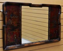 AN ORIENTAL OBLONG MIRROR with a panel to each side of the mirror decorated with a raised and