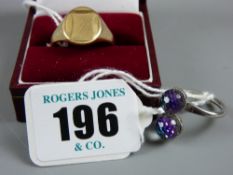 A nine carat gold oval face gent's signet ring, 6.5 grms and a white metal dress ring with two