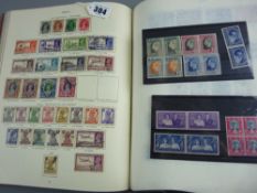 A King George VI stamp album by Stanley Gibbons Ltd, part filled well laid collection within