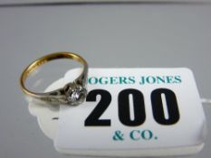 An eighteen carat gold diamond solitaire dress ring with platinum shoulders, visual estimate 0.3