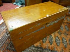 A CAMPHORWOOD LIDDED CHEST, scumble painted with brass carry handles, 49 x 96 x 43 cms