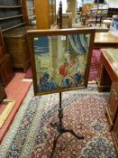 A GEORGIAN MAHOGANY POLESCREEN with classically scened rectangular framed panel on a finial capped
