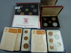 TWO PLASTIC FIVE COIN WALLETS, two red plush cased five coin packs 'Britain's First Decimal Coins'