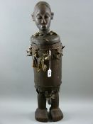 A 20TH CENTURY CARVED TRIBAL FETISH CONTAINER, probably Yakuba, Congo Region, a carved cylindrical