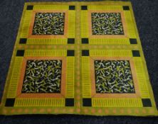 A SECTION OF GRAHAM SUTHERLAND DESIGNED CARPET in a geometric and naturalistic pattern in a green