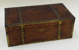 A BURR-WALNUT CAMPAIGN STYLE LAP-DESK with brass reinforcements, carry-handles and escutcheon, the