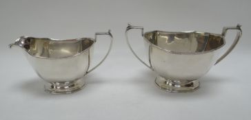 A SILVER FACETED SUGAR BASIN & MATCHING CREAM JUG, Sheffield 1963, 10ozs
