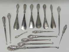 SIX SILVER-HANDLED SHOE HORNS & TEN SIMILAR BUTTON HOOKS
