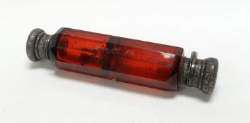 A CRANBERRY GLASS & SILVER SCENT / SMELLING SALT 'DOUBLE' with hinged foliate engraved lids, 12cms