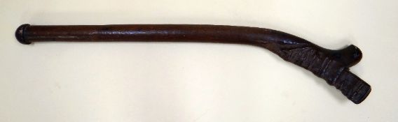A FIJIAN WAR CLUB of gunstock form, 11cms long
