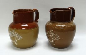 TWO DENBY ADVERTISING JUGS FOR CADBURY'S in two tone brown stoneware, one with the following to