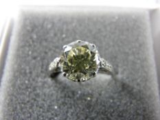 A LADY'S DIAMOND SOLITAIRE RING, eighteen carat gold, platinum set, visual estimate 2.6 carats, 8.