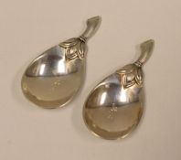 A PAIR OF ITALIAN SILVER NOVELTY CADDY SPOONS in the form of plum tomatoes with engraved stalks as