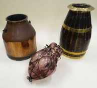 A PURPLE GLASS HANGING LANTERN in a metallic scroll-work frame, together with a cooper-work umbrella