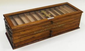 A HABERDASHERY RETAILER'S COTTON DISPLAY CABINET in oak of rectangular form and having three