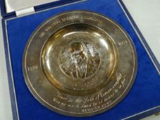 A WINSTON CHURCHILL CENTENARY COMMEMORATIVE SILVER DISH with inscription and dates, complete with