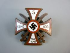 A WWII 5th DON COSSACKS CAVALRY REGIMENT CROSS, red and white enamelled with central swastika 1941