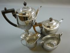 A FOUR PIECE SILVER TEA AND COFFEE SET each piece of oval form with half body fluted/plain