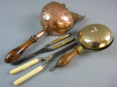 AN EARLY 19th CENTURY WELL WORN COPPER AND STEEL FLOUR SHOVEL with turned and shaped handle, an