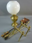 A GOOD PAIR OF SOLID BRASS TRESTLE FIRE DOGS, a pair of brass fire irons - poker and tongs, a