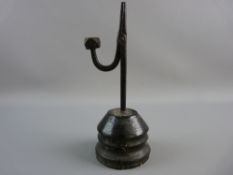 AN 18th CENTURY TWIST COLUMN IRON RUSH LIGHT HOLDER with tallow holder arm on original turned