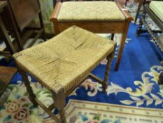 AN OAK PIANO STOOL circa 1930 and a rush seated oak barley twist stool