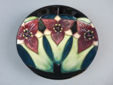 A BOXED MOORCROFT MODERN PATTERN PIN DISH, 11.5 cms diameter, impressed factory marks with