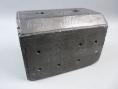 A WELSH SLATE DOORSTOP, 19th Century in the form of a four drawer chest with fan and swirl