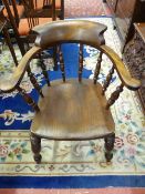 A VICTORIAN SMOKER'S BOW ARMCHAIR, 66.5 cms maximum width