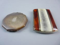 A LADY'S SILVER COMPACT and non-silver cigarette case, engine turned decoration with monogram,