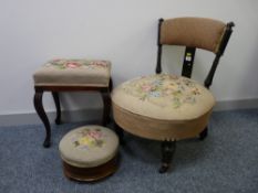A VICTORIAN EBONIZED SALON CHAIR, a circular inlaid walnut footstool and a reproduction mahogany