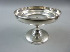 A SMALL HALLMARKED SILVER PEDESTAL BOWL, Chester 1918, 7 cms high, 9.5 cms diameter top, base