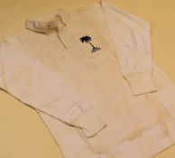 A FIJI INTERNATIONAL RUGBY UNION SQUAD JERSEY, bearing crest to panel and stitched No.24, 'Presented